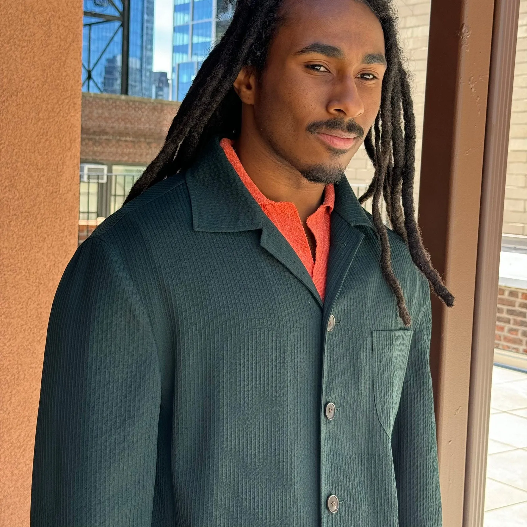 x Sartoria Carrara: chore jacket in dark green wool "seersucker"